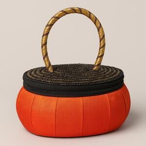 brand new pouch in orange, black, and gold tones